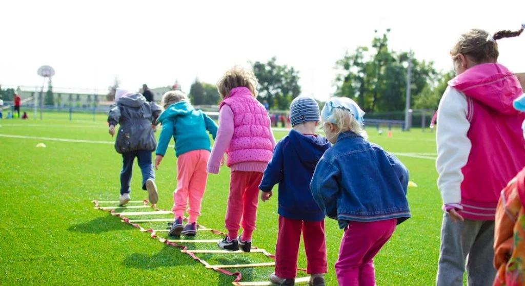 happy children playing outdoors together