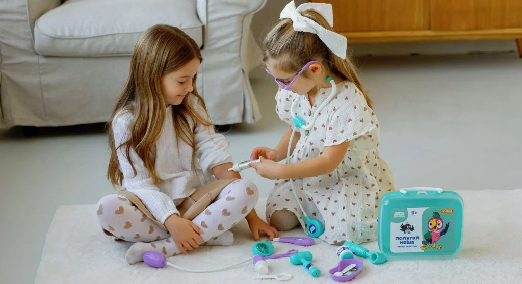Child assigning play roles to others during pretend play