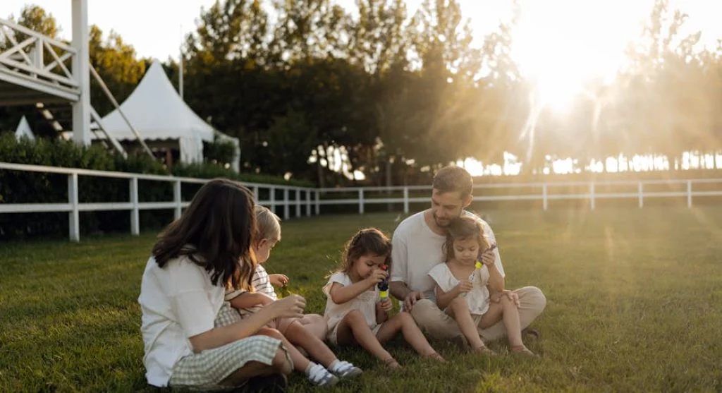 parents with kids playing together