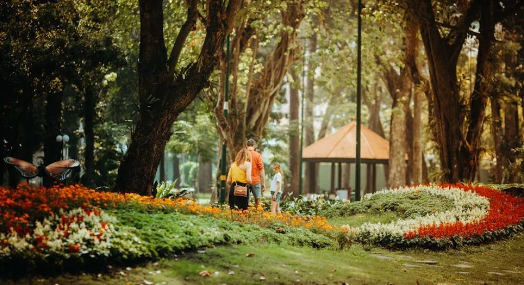 family playing in park together
