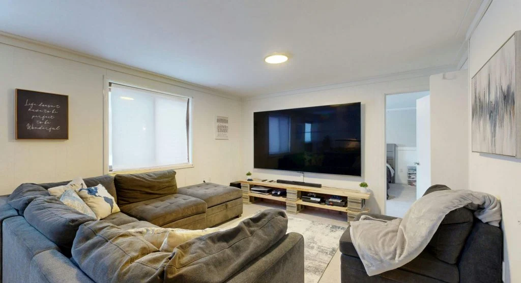 Shared family room arranged as one regular screen-use spot for children at home