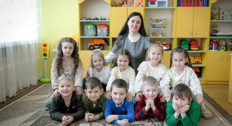 children taking turns with guidance