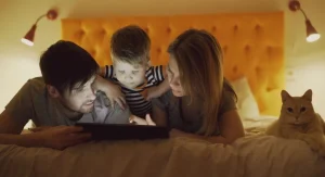 Parent and child talking during a side-by-side activity at home