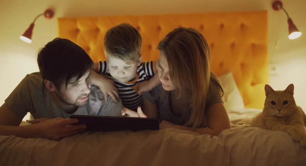 Parent and child talking during a side-by-side activity at home