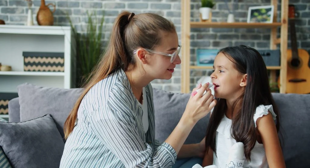 Parent asking a child a simple question during a calm conversation at home