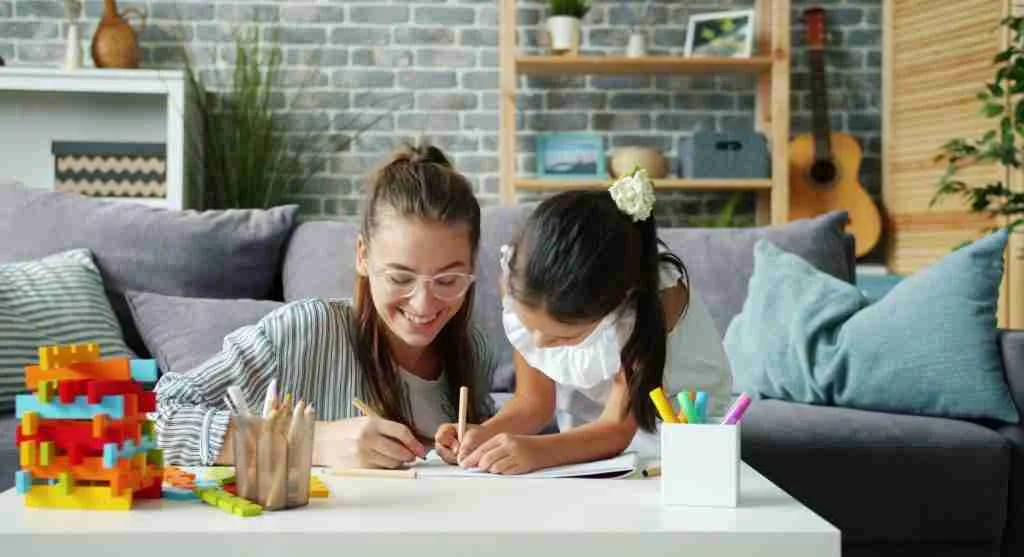 Parent guiding a child to compare one clear feature between two objects