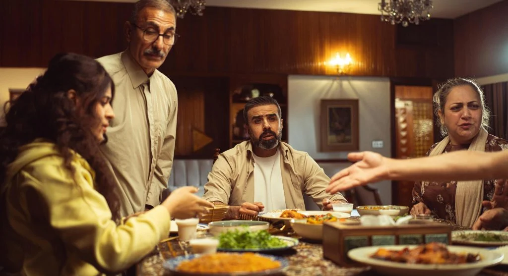Family sharing a tiny evening ritual during ordinary home life