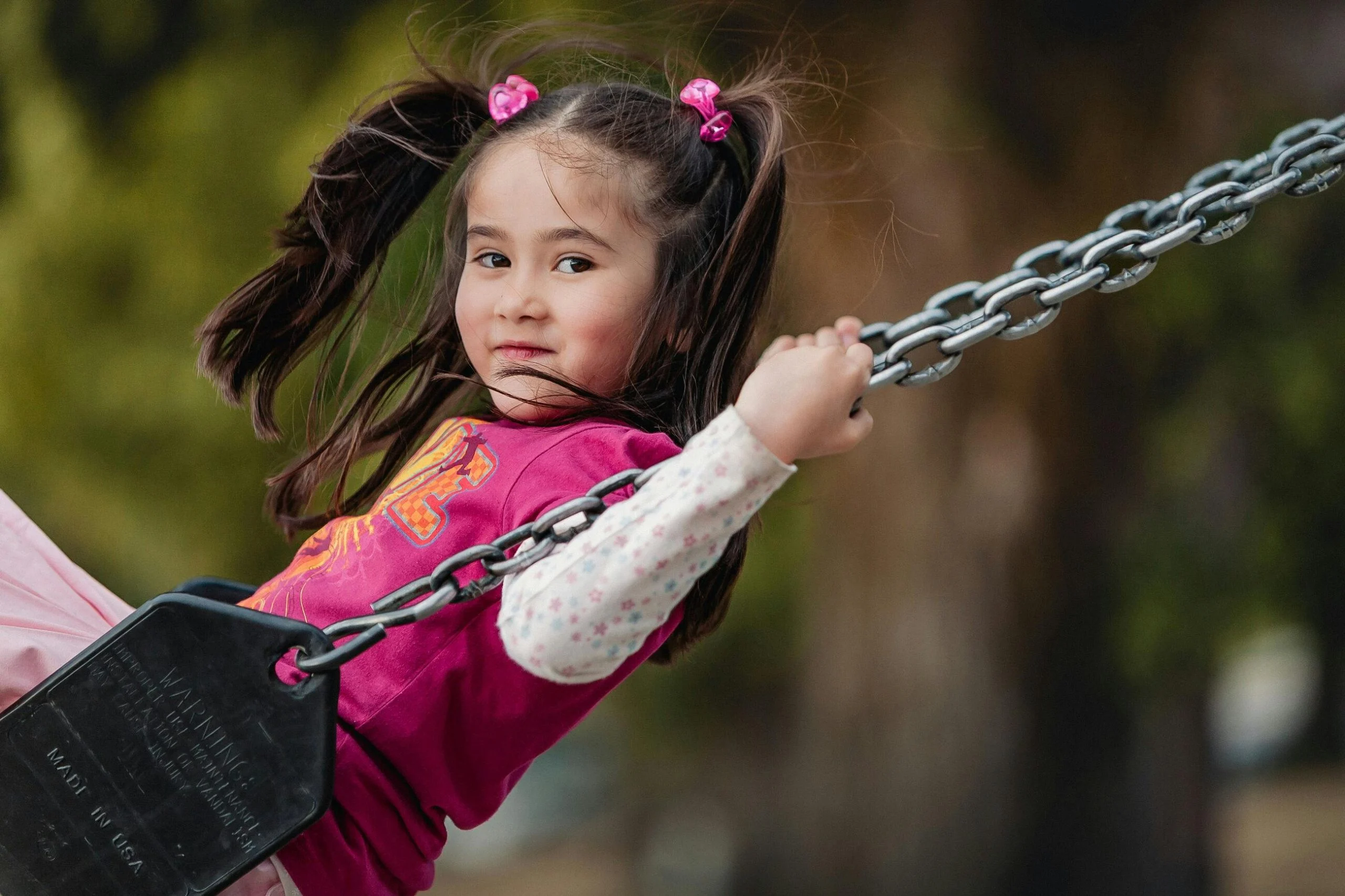 child playing alone outdoors