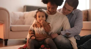 Parent helping a child handle a not yet moment calmly at home