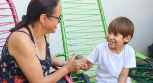 Child explaining the day more clearly during a conversation at home