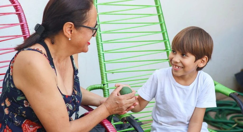 Child explaining the day more clearly during a conversation at home