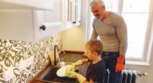 kid doing household chores