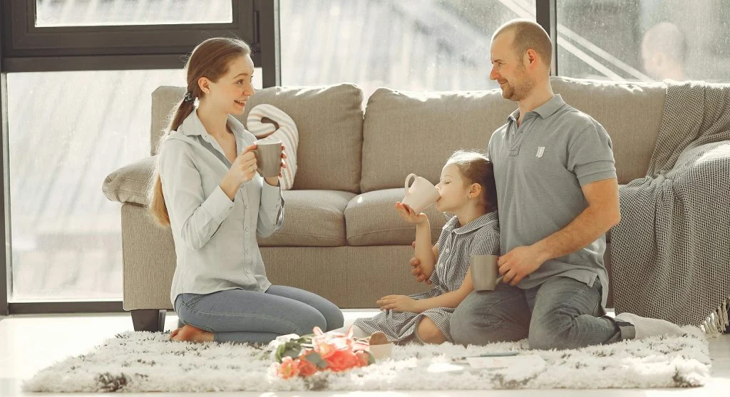 family watching movie together at home