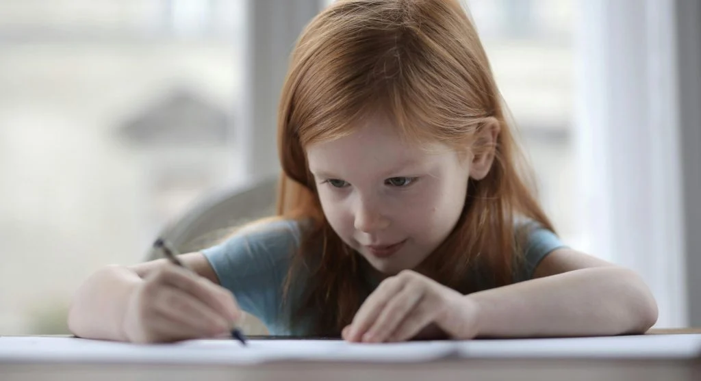 kid thinking about corrected mistake