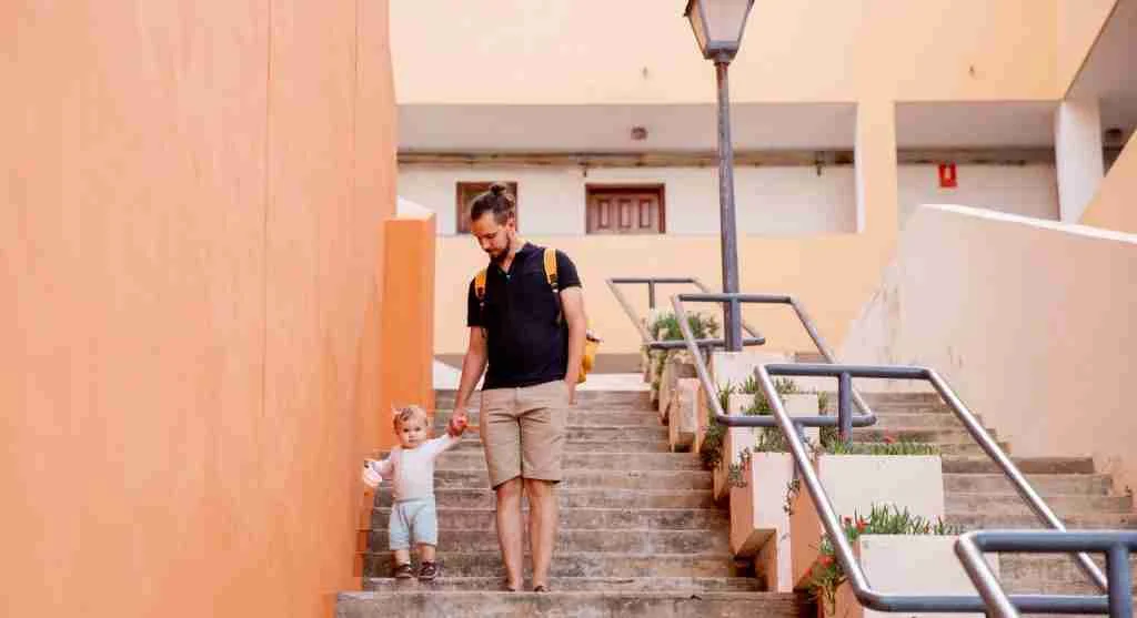 Parent and child retracing the steps of a forgotten task together