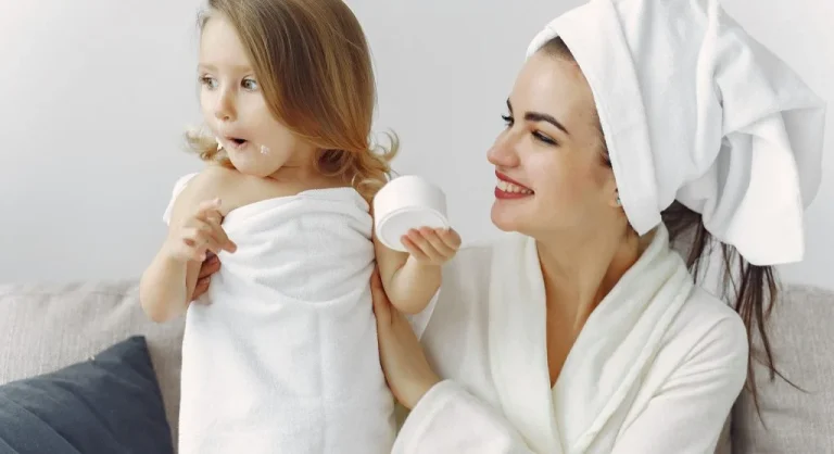 Warm towel visible before a child finishes bath time at home