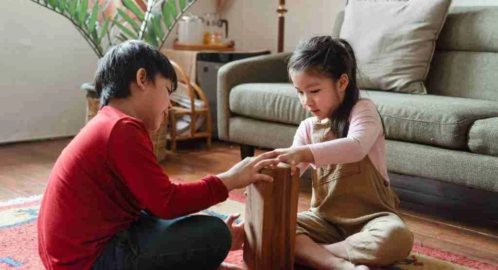 Child feeling left out while siblings or friends play together