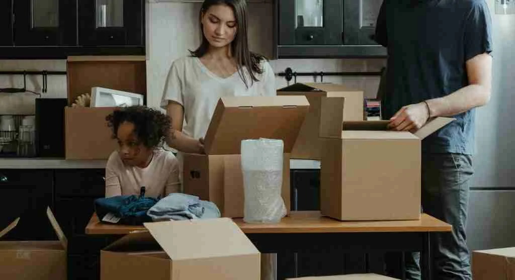 Small real-world transition items placed near a family screen area at home