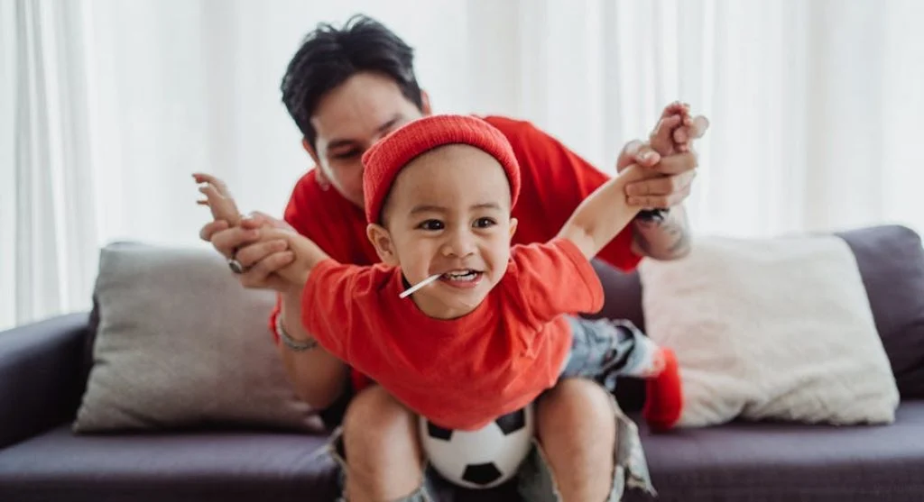 parent and child playing together