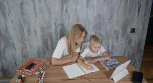 parent helping child with homework