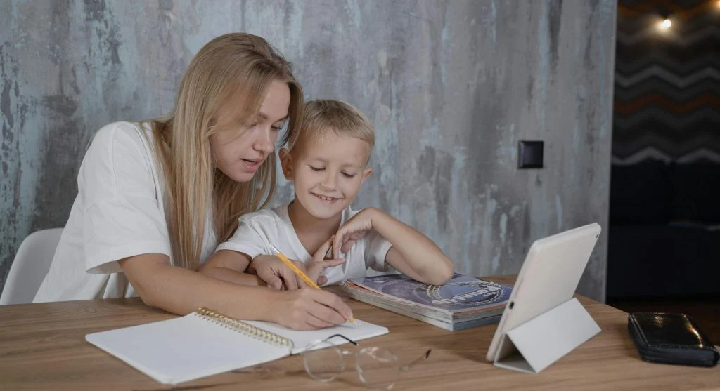 parent helping child with homework