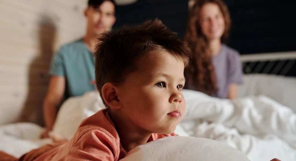 Child looking uncomfortable after an awkward moment at home
