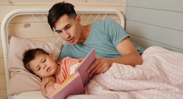 family reading together in bed