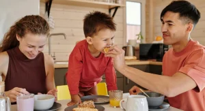 family having breakfast together