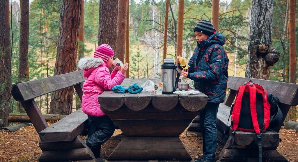 Child seeing a familiar special snack packed before a family outing