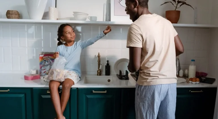 Parent explaining the next two minutes of a routine to a child at home