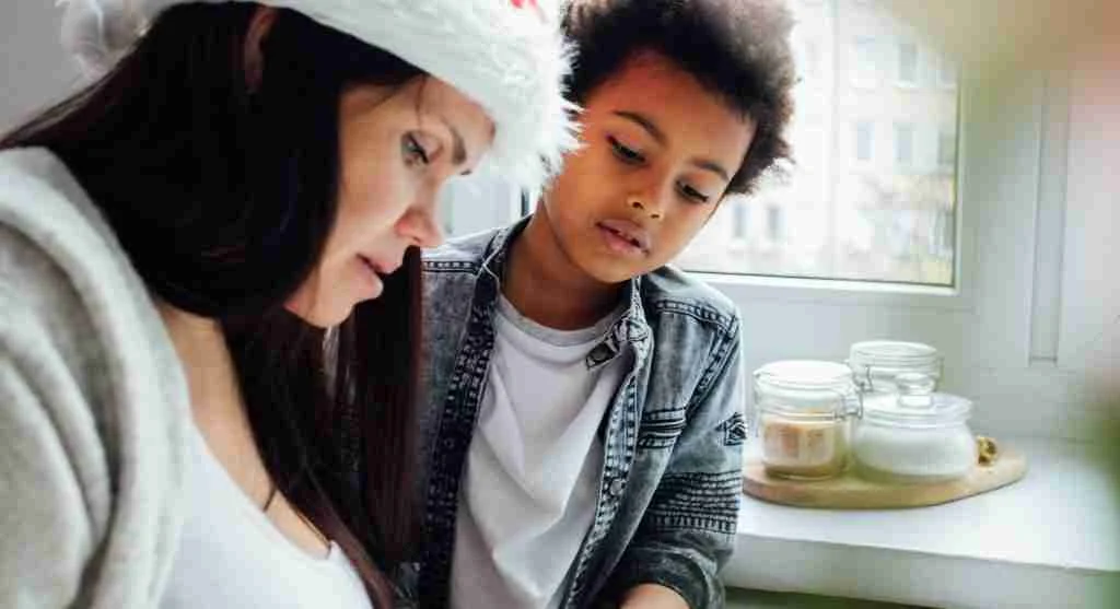 Child copying a letter with the example placed above the writing line at home