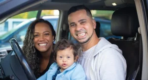Family sharing a familiar ride home ritual together after an outing