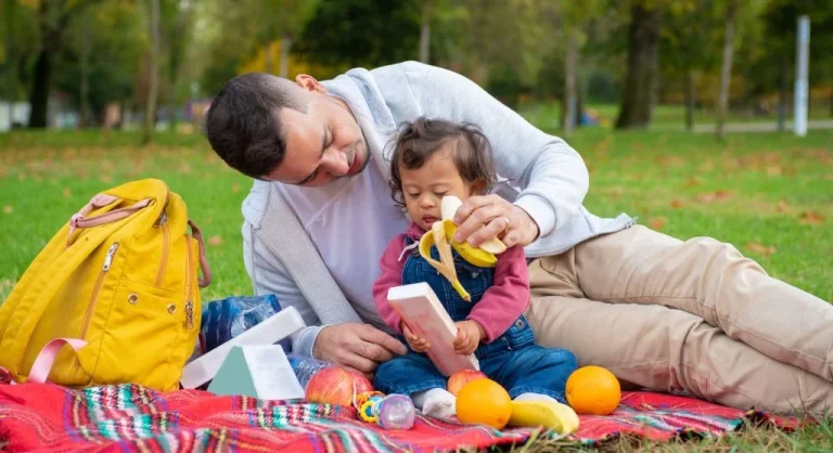 Parent packing a familiar snack for a repeated family outing