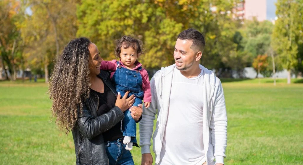 Parent and child having a side-by-side conversation during a walk