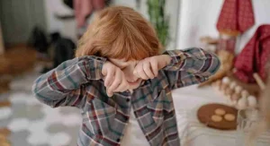 Child reacting strongly to something that feels unfair at home