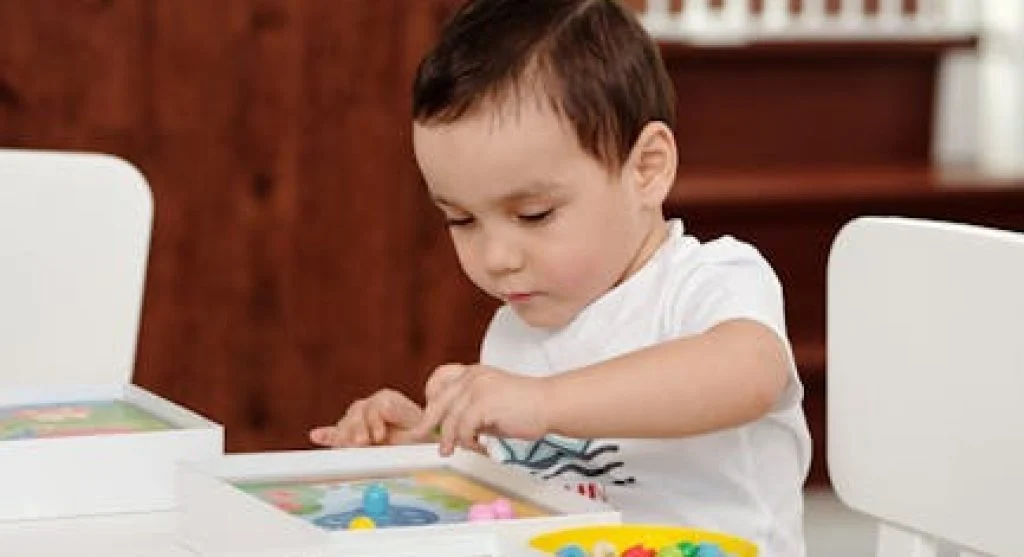 kid playing focused intently