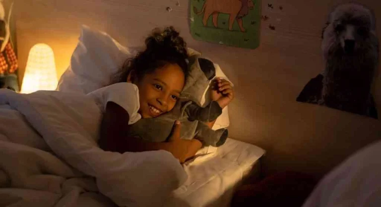 Child’s bed turned down before pajama time during a bedtime routine