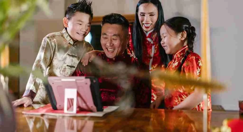 Family listening to a familiar opening song as a tradition begins