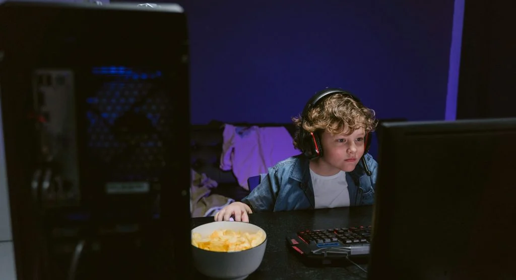 Child finishing one final round of a game before screen time ends