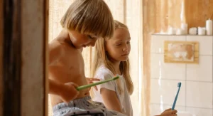 Why Children Often Brush Teeth With Less Resistance When the Water Is Already Running Before the Reminder
