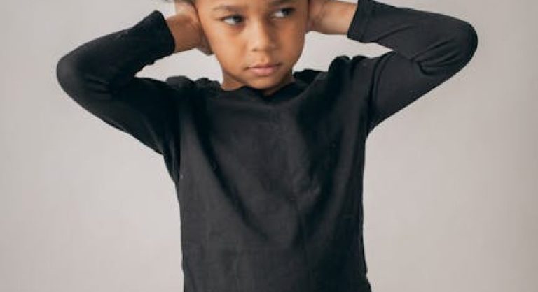 upset kid with arms crossed