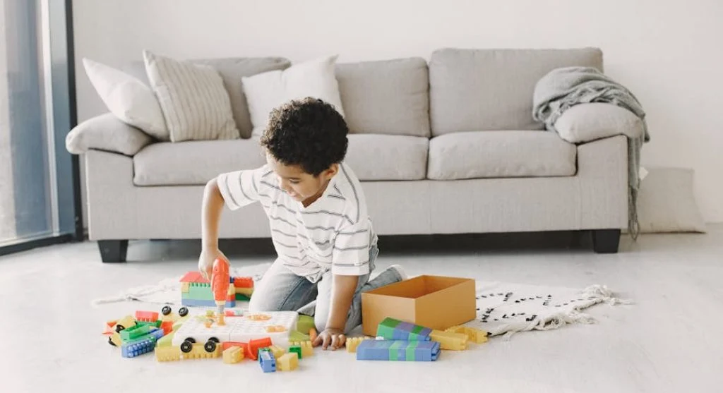 kid playing alone outdoors