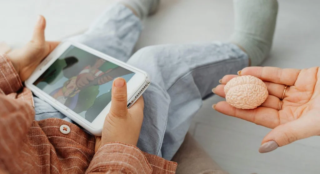 Child following a familiar break routine after device use at home