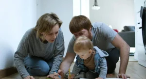 Parent and child ending a home practice session with a quick successful activity