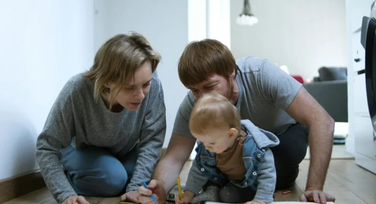 Parent and child ending a home practice session with a quick successful activity
