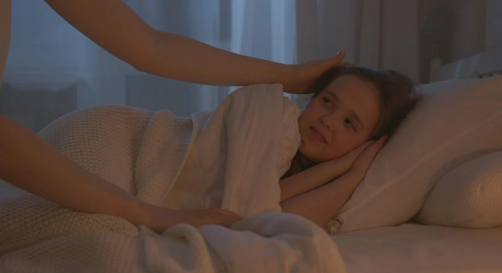 child learning self-control with adult guidance