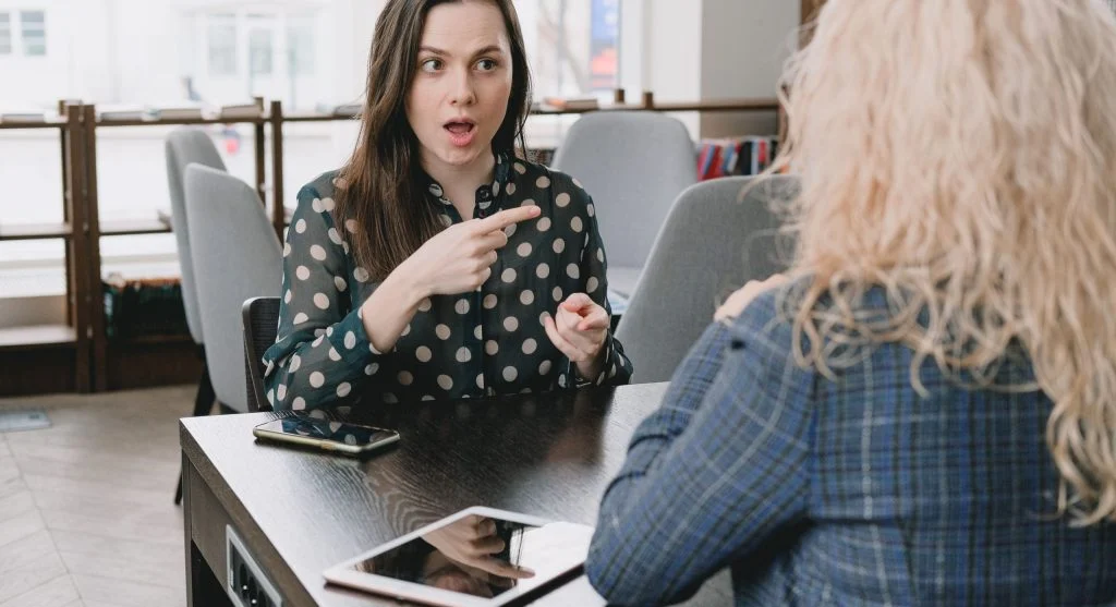 Child giving back a phone after hearing a clear end-of-turn phrase