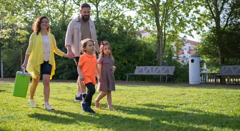 happy family walking together outdoors