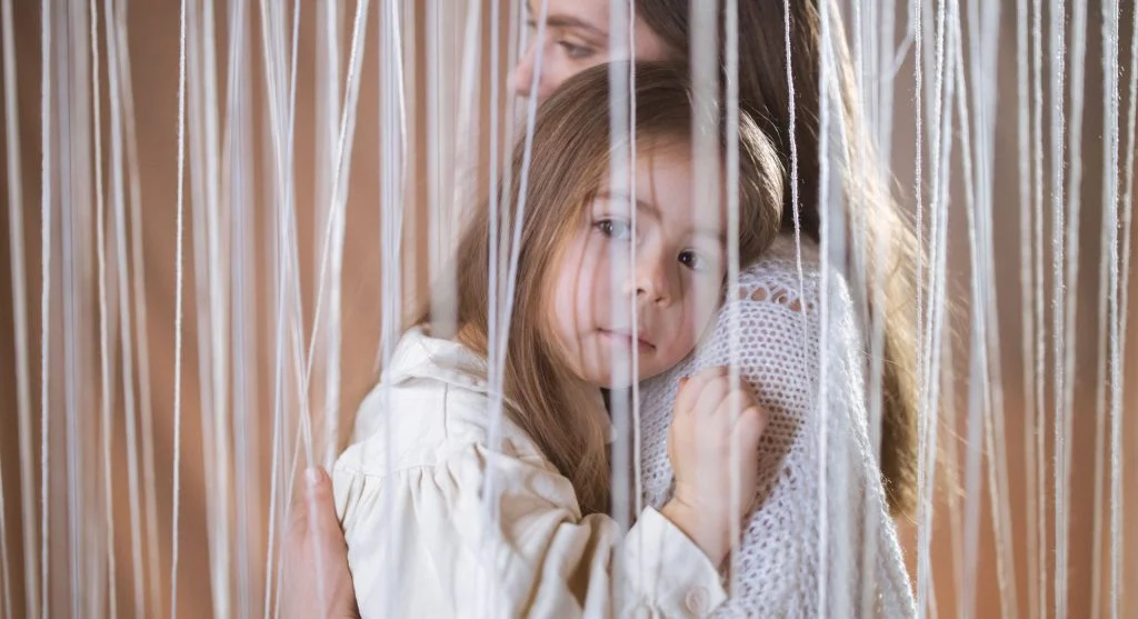 parent holding limit with calm child