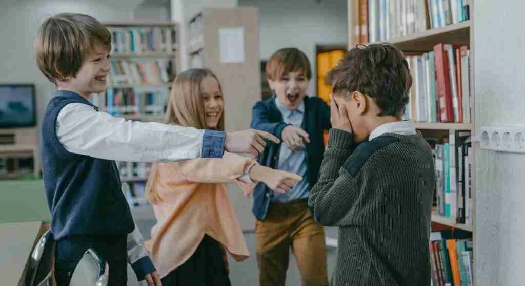 Child reacting to a socially awkward moment with growing social awareness